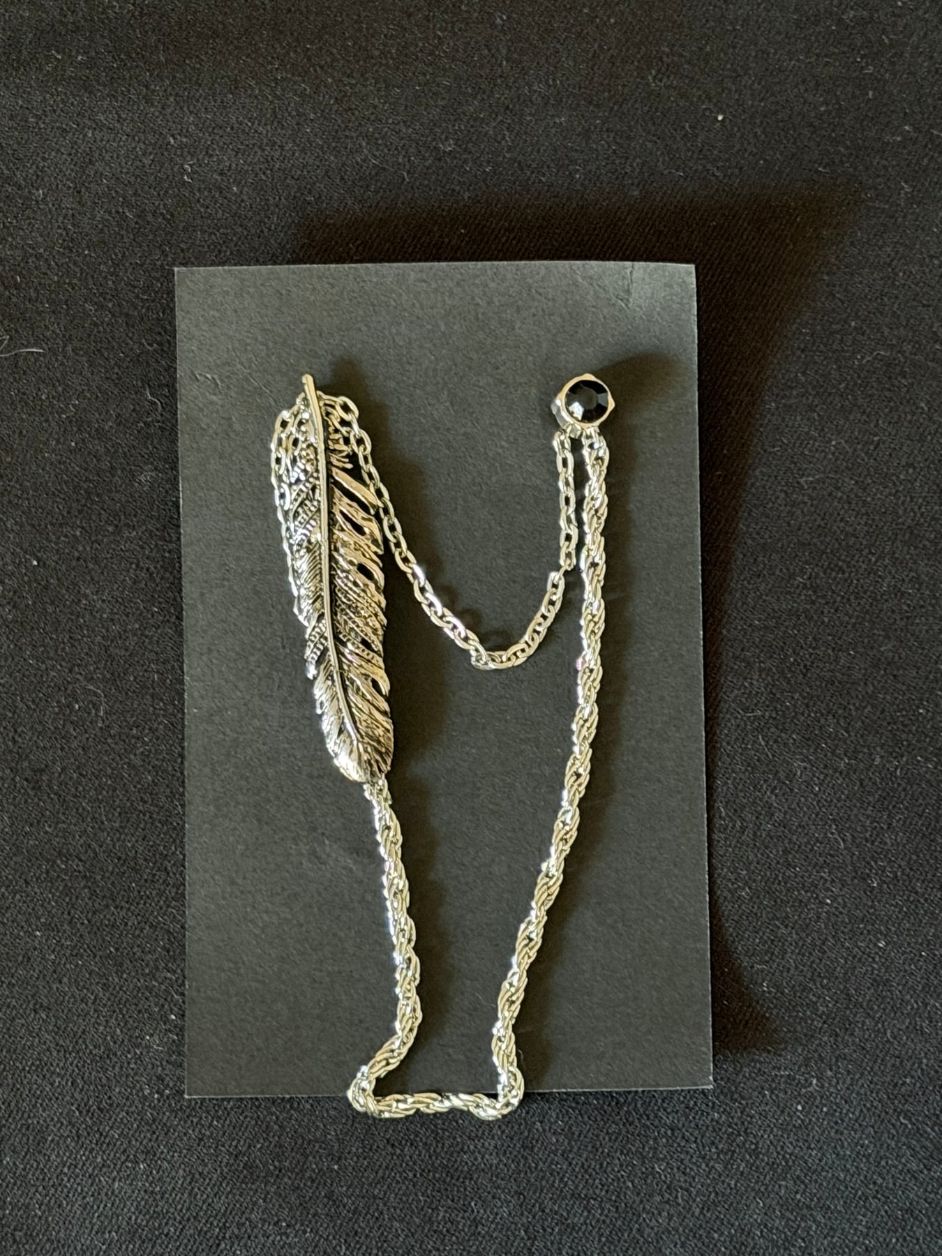 Feather silver video thumbnail 1